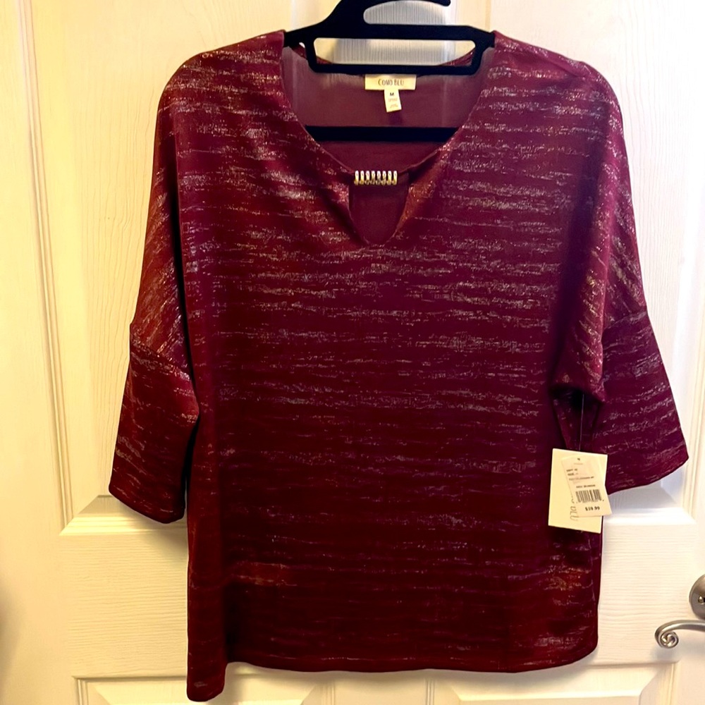 Ladies, new Como blu top size medium